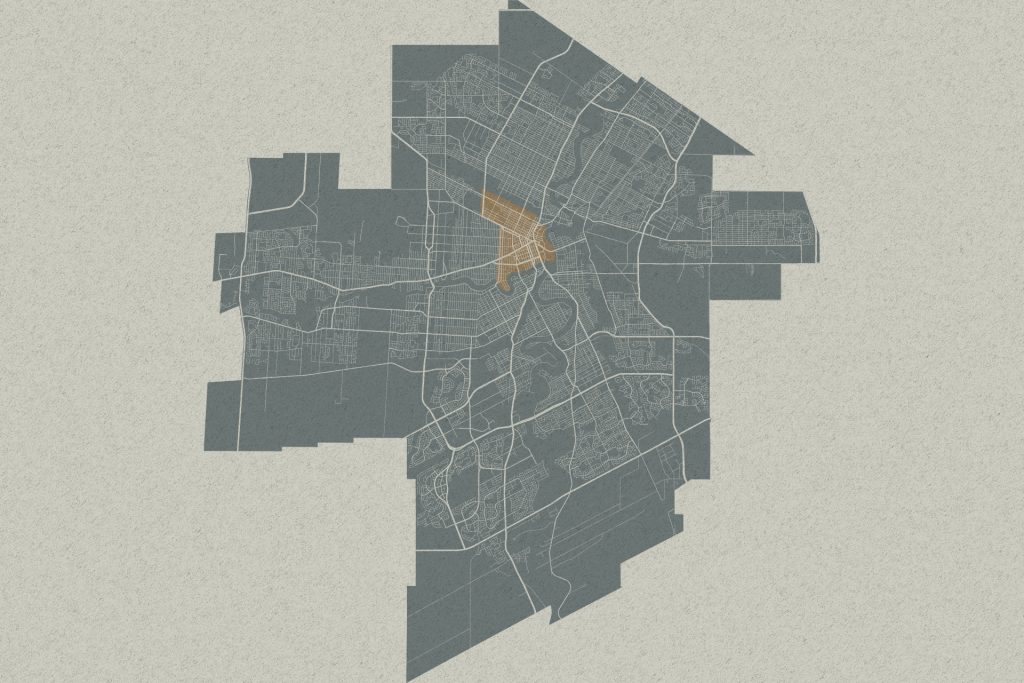 Stylized city map with a highlighted central district in orange