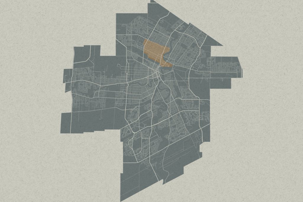 City map with a highlighted central district in orange