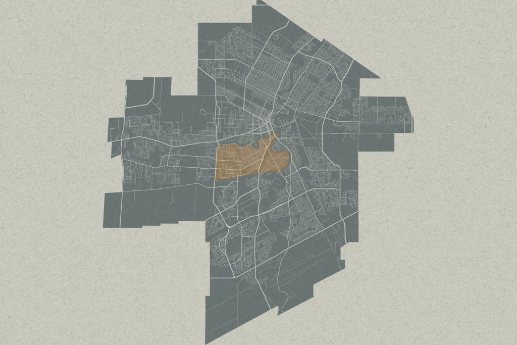 Stylized city map with a highlighted central district in orange