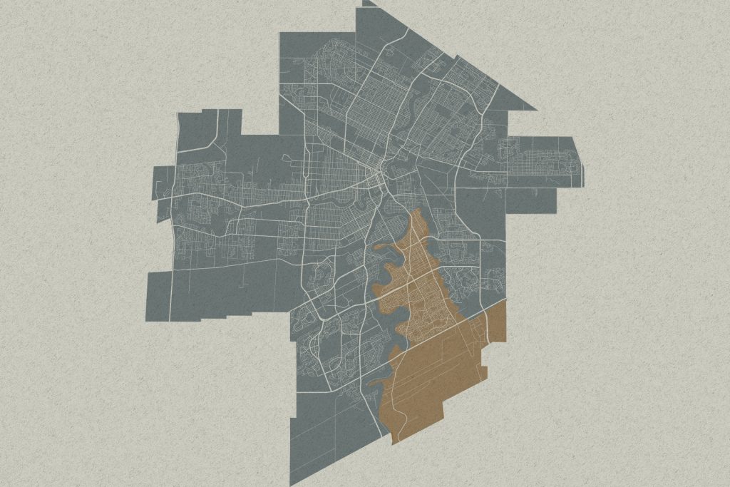 Stylized city map with highlighted districts in blue-gray and tan
